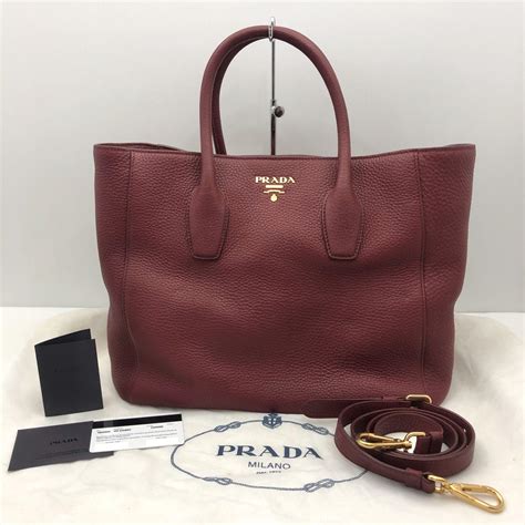 prada vitello daino tote cerise|Prada vitello daino shoulder bag.